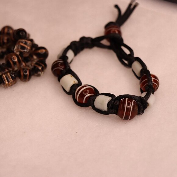 Set of two corded beaded braided bracelets in brown earth tones - Picture 2 of 4